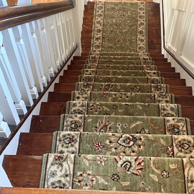 green patterned stair runner